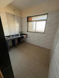 Kitchen Image of 680 Sq.ft 1 BHK Apartment / Flat for sale in Mohan Willows I, Badlapur East Badlapur for Rs. 2850000