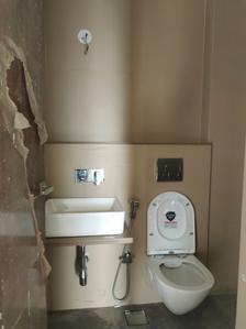 Common Bathroom Image of 759 Sq.ft 2 BHK Apartment / Flat for sale in Sri Arthaya, Kandivali West Mumbai for Rs. 17000000