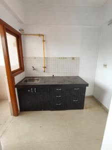 Kitchen Image of 700 Sq.ft 1 BHK Apartment / Flat for rent in Applewoods Satyesh Residency, Shela Ahmedabad for Rs. 15500