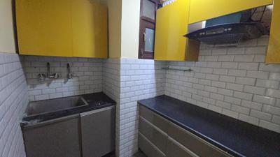 Kitchen Image of 915 Sq.ft 3 BHK Builder Floor for rent in Palam New Delhi for Rs. 26500