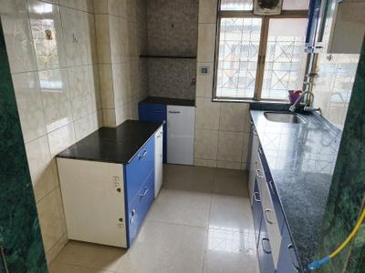Kitchen Image of 660 Sq.ft 2 BHK Apartment / Flat for rent in Kashish Park, Dharamveer Nagar Thane for Rs. 35000