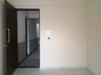 Living Room Image of 650 Sq.ft 1 BHK Apartment / Flat for sale in Tharwani Vedant Nakshatra Wing K Phase V, Badlapur West Badlapur for Rs. 2800000