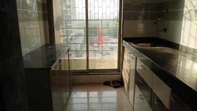 Kitchen Image of 610 Sq.ft 1 BHK Apartment / Flat for sale in United Properties Kailash Sadan, Kalamboli Navi Mumbai for Rs. 4500000