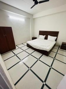 Bedroom Image of Maa Vatika PG in Sector 35, Noida