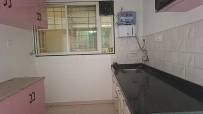 Kitchen Image of 950 Sq.ft 2 BHK Apartment / Flat for rent in Ganraj Skydale, Mohammed Wadi Pune for Rs. 22000