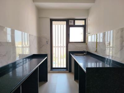 Kitchen Image of 931 Sq.ft 2 BHK Apartment / Flat for sale in Aditya Paradiso, Andheri West Mumbai for Rs. 19600000