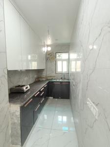 Kitchen Image of 1250 Sq.ft 2 BHK Builder Floor for rent in Vivek Vihar New Delhi for Rs. 36000