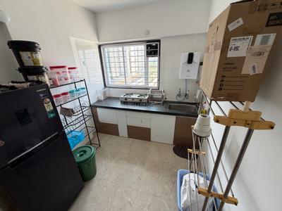 Kitchen Image of 650 Sq.ft 1 BHK Apartment / Flat for rent in Mahalunge Pune for Rs. 22000