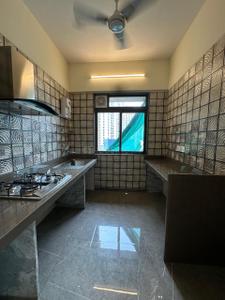 Kitchen Image of 650 Sq.ft 1 BHK Apartment / Flat for sale in Paradise Sai World Dreams, Dombivli East Thane for Rs. 5500000