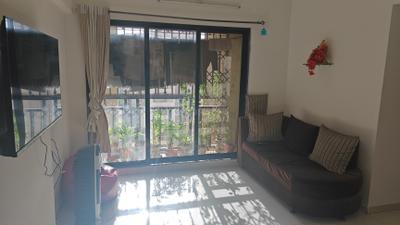 Living Room Image of 845 Sq.ft 2 BHK Apartment / Flat for sale in Unnati Woods Phase 7, Kasarvadavali Thane for Rs. 12500000
