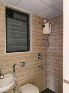 Common Bathroom Image of 750 Sq.ft 1 BHK Apartment / Flat for sale in Lodha Palava Premier, Dombivli East Thane for Rs. 4600000
