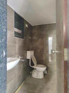 Common Bathroom One Image of 650 Sq.ft 1 BHK Apartment / Flat for sale in Wonder Park, Fatherwadi Vasai for Rs. 4023000