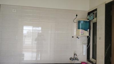 Kitchen Image of 900 Sq.ft 1 BHK Apartment / Flat for rent in Ravinanda Skylights, Wagholi Pune for Rs. 16000
