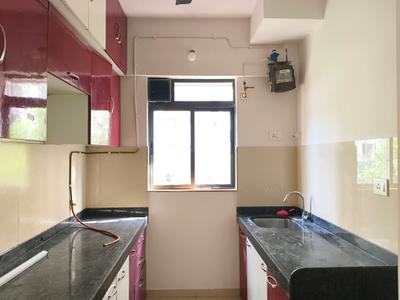Kitchen Image of 690 Sq.ft 1 BHK Apartment / Flat for sale in Lodha Lakeshore Greens, Palava Phase 2 Thane for Rs. 3150000