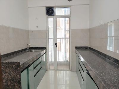 Kitchen Image of 850 Sq.ft 2 BHK Apartment / Flat for rent in Marathon Nexzone, Kolkhe Navi Mumbai for Rs. 23000