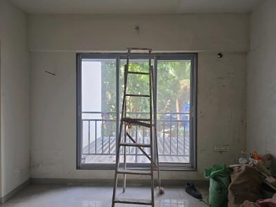 Living Room Image of 540 Sq.ft 1 BHK Apartment / Flat for sale in Laxmi Vishwa Vihang Heights, Dahisar East Mumbai for Rs. 9800000