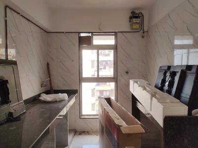 Kitchen Image of 525 Sq.ft 1 BHK Apartment / Flat for sale in Dharti Pressidio, Kandivali West Mumbai for Rs. 9300000