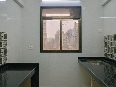Kitchen Image of 850 Sq.ft 1 BHK Apartment / Flat for sale in Kalyan West Kalyan for Rs. 7500000