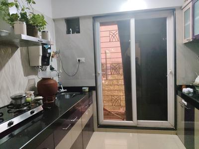 Kitchen Image of 945 Sq.ft 2 BHK Apartment / Flat for sale in Arihant Aarohi, Shilgaon Thane for Rs. 6700000