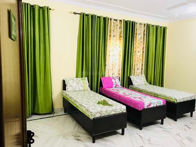 Bedroom Image of Shiv PG in Gota, Ahmedabad