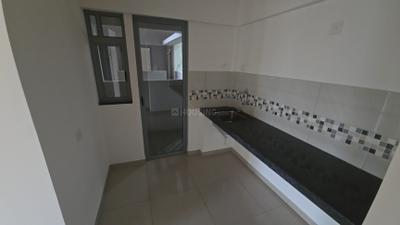 Kitchen Image of 600 Sq.ft 1 BHK Apartment / Flat for rent in Mahindra Happinest Tathawade, Tathawade Pune for Rs. 21000