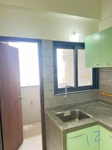 Kitchen Image of 2057 Sq.ft 3 BHK Apartment / Flat for sale in The Centrium, Memnagar Ahmedabad for Rs. 16500000