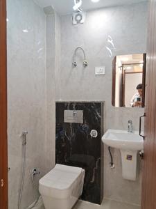 Common Bathroom Image of 600 Sq.ft 2 BHK Builder Floor for sale in Dwarka Mor New Delhi for Rs. 3600000