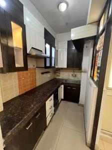 Kitchen Image of 814 Sq.ft 2 BHK Apartment / Flat for rent in Ajnara Integrity, Raj Nagar Extension Ghaziabad for Rs. 16000