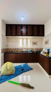 Kitchen Image of 600 Sq.ft 1 BHK Builder Floor for rent in Domlur Layout Bengaluru for Rs. 25500
