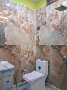Common Bathroom Image of 1050 Sq.ft 2 BHK Apartment / Flat for sale in Sector 49 Noida for Rs. 4300000