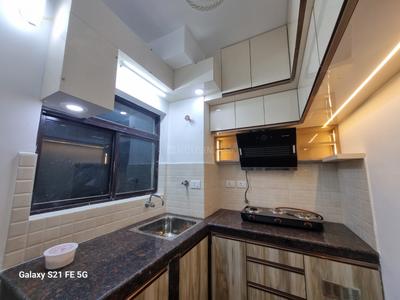 Kitchen Image of 948 Sq.ft 2 BHK Apartment / Flat for sale in Signum Windflower, Madhyamgram Kolkata for Rs. 6200000