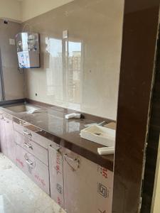 Kitchen Image of 780 Sq.ft 1 BHK Apartment / Flat for rent in Tharwanis Sky View, Kharghar Navi Mumbai for Rs. 25000