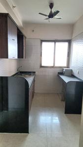 Kitchen Image of 660 Sq.ft 1 BHK Apartment / Flat for sale in Vishesh Balaji Symphony, Shilottar Raichur Navi Mumbai for Rs. 4800000