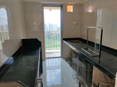 Kitchen Image of 700 Sq.ft 1 BHK Apartment / Flat for sale in Uma Elements Building B Vayu, Daighar Gaon Thane for Rs. 3850000