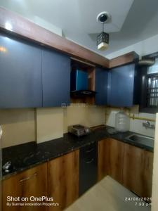 Kitchen Image of 450 Sq.ft 1 BHK Builder Floor for rent in Dwarka Mor New Delhi for Rs. 10500