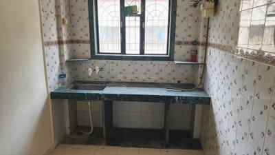 Kitchen Image of 375 Sq.ft 1 RK Apartment / Flat for rent in Kashish Park, Dharamveer Nagar Thane for Rs. 19000