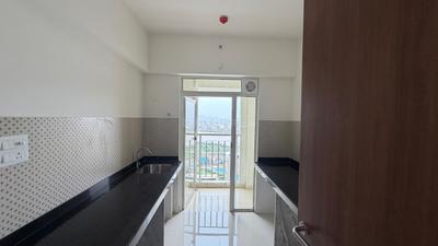 Kitchen Image of 938 Sq.ft 2 BHK Apartment / Flat for rent in Lodha Amara, Kolshet Thane for Rs. 45000
