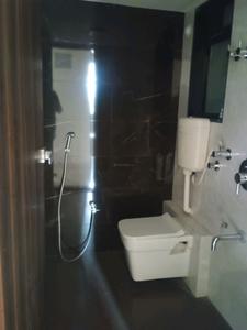 Common Bathroom Image of 794 Sq.ft 1 BHK Apartment / Flat for sale in Rustomjee Urban Woods Palm, Dombivli East Thane for Rs. 5450000