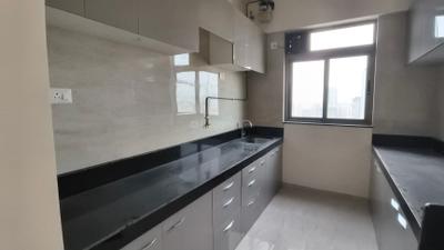 Kitchen Image of 920 Sq.ft 2 BHK Apartment / Flat for sale in Sheth Auris Serenity Tower 3, Malad West Mumbai for Rs. 30000000
