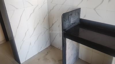 Kitchen Image of 695 Sq.ft 1 BHK Apartment / Flat for sale in Bhoomi Lawns Phase II, Shilgaon Thane for Rs. 3900000
