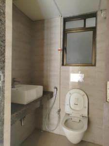 Common Bathroom Image of 700 Sq.ft 2 BHK Apartment / Flat for sale in Sunteck World, Naigaon East Naigaon for Rs. 4300000