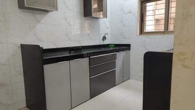 Kitchen Image of 1090 Sq.ft 2 BHK Apartment / Flat for sale in Vishesh Balaji Symphony, Panvel Navi Mumbai for Rs. 8200000