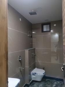 Common Bathroom Image of 700 Sq.ft 2 BHK Builder Floor for sale in Pitampura New Delhi for Rs. 7500000