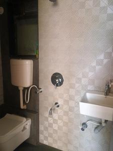 Common Bathroom Image of 628 Sq.ft 1 BHK Apartment / Flat for sale in Amrut Laxmi Raj Regalia Phase I, Ambernath East Ambernath for Rs. 2300000