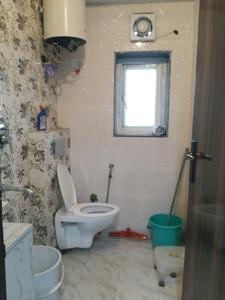 Common Bathroom Image of 367 Sq.ft 1 RK Apartment / Flat for rent in DLF Capital Greens, Karampura New Delhi for Rs. 23500