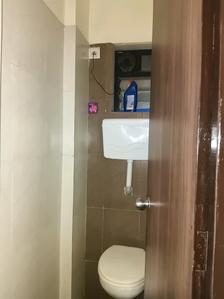Common Bathroom Image of 650 Sq.ft 1 BHK Apartment / Flat for sale in Raunak City, Kalyan West Kalyan for Rs. 3500000