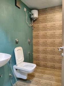 Common Bathroom Image of 700 Sq.ft 2 BHK Apartment / Flat for sale in Lodha Amara, Thane West Thane for Rs. 12200000