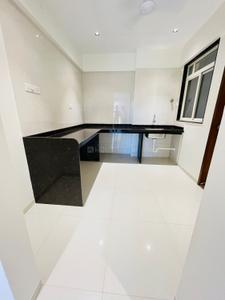 Kitchen Image of 979 Sq.ft 2 BHK Apartment / Flat for sale in Nirman Brookefield Willows, Pisoli Pune for Rs. 4819000