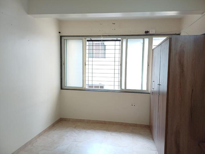 Pranjali Apartment Bedroom 1