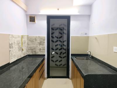 Kitchen Image of 950 Sq.ft 2 BHK Apartment / Flat for rent in Lodha Palava Downtown, Palava Phase 2 Thane for Rs. 18999